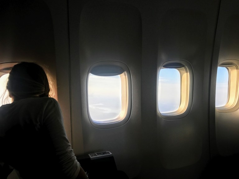 Sarah looking off the plane.JPG